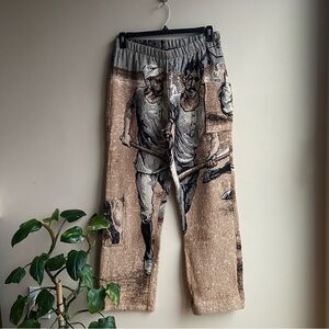 Beige Graphic Knit Joggers with Worker Motif